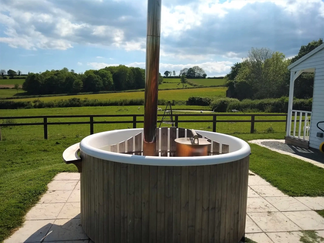 Cabin glamping with hot tub on a Somerset farm