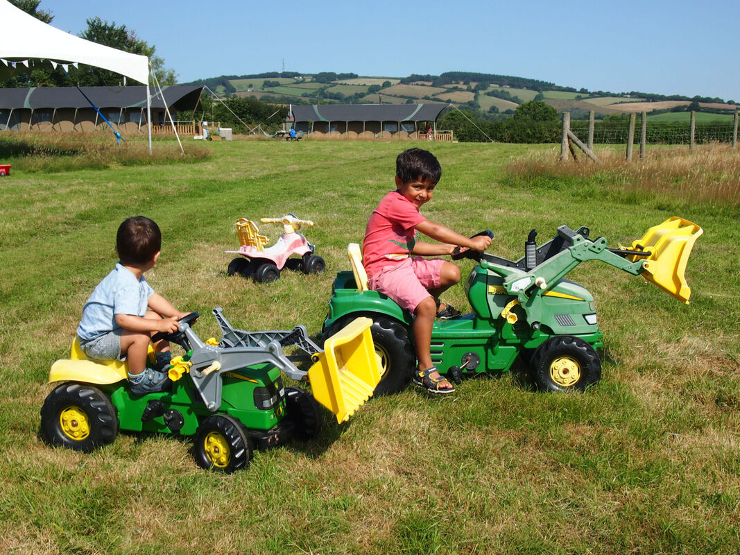 children's play area on the farm near safari tents