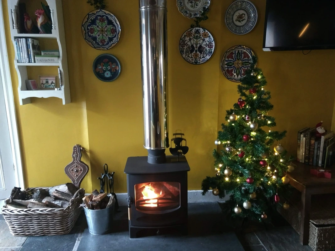 holiday cottage wood burner christmas tree