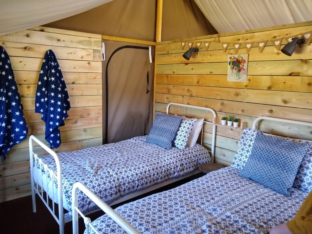 Glamping safari tent bedroom 